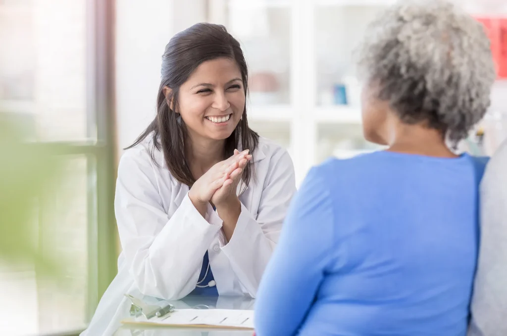 Clinician smiling and feeling fulfilled